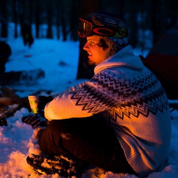 Michael enjoying a winter campfire